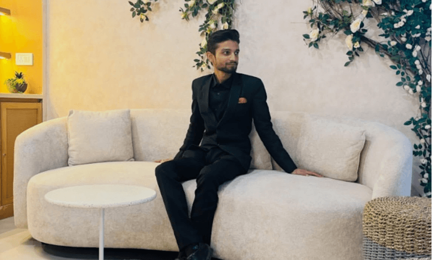 Sitting on a couch, dressed up