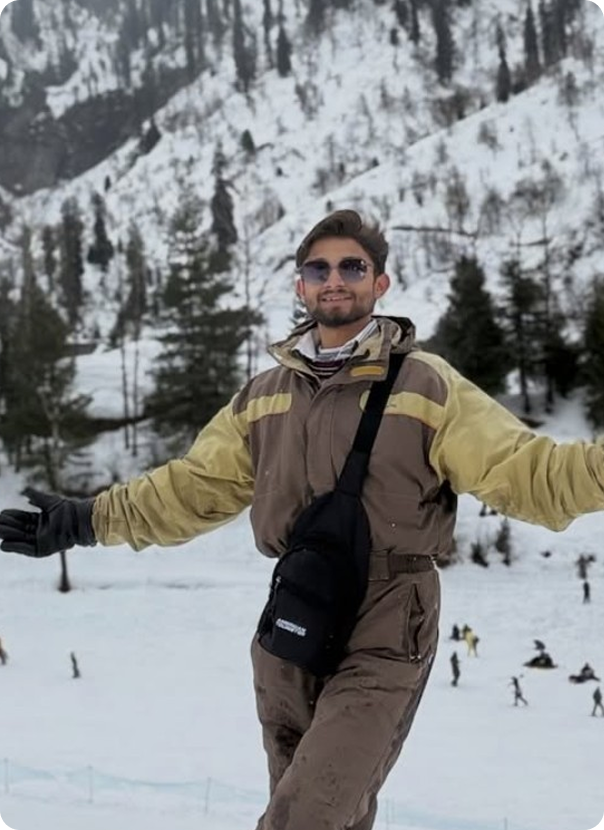 Aman on a snowy mountain trail